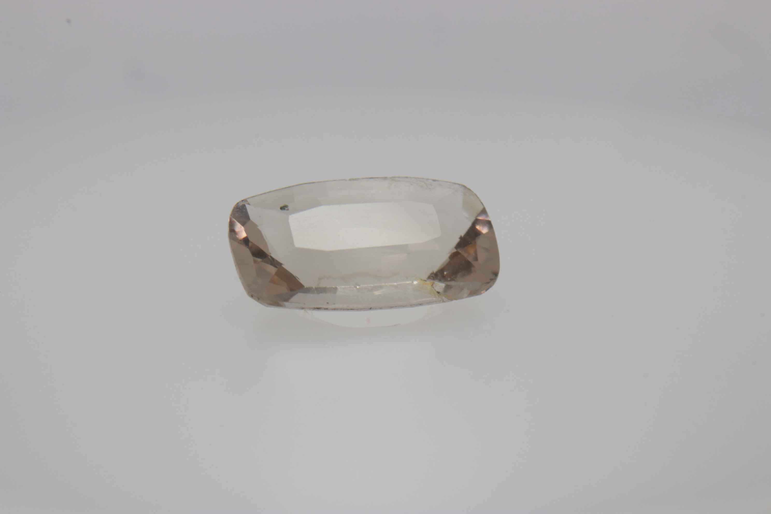 0.7ct White - Off Spinel SI1 Fancy Cushion Shape (7.3x4.4x2.8 mm) Unheated gemstone from Sri Lanka