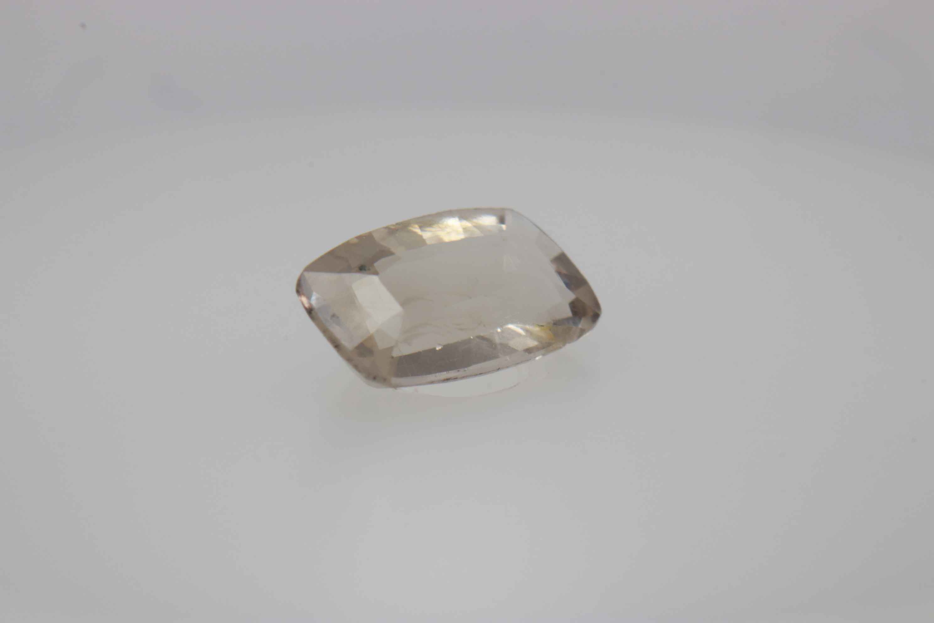 0.7ct White - Off Spinel SI1 Fancy Cushion Shape (7.3x4.4x2.8 mm) Unheated gemstone from Sri Lanka