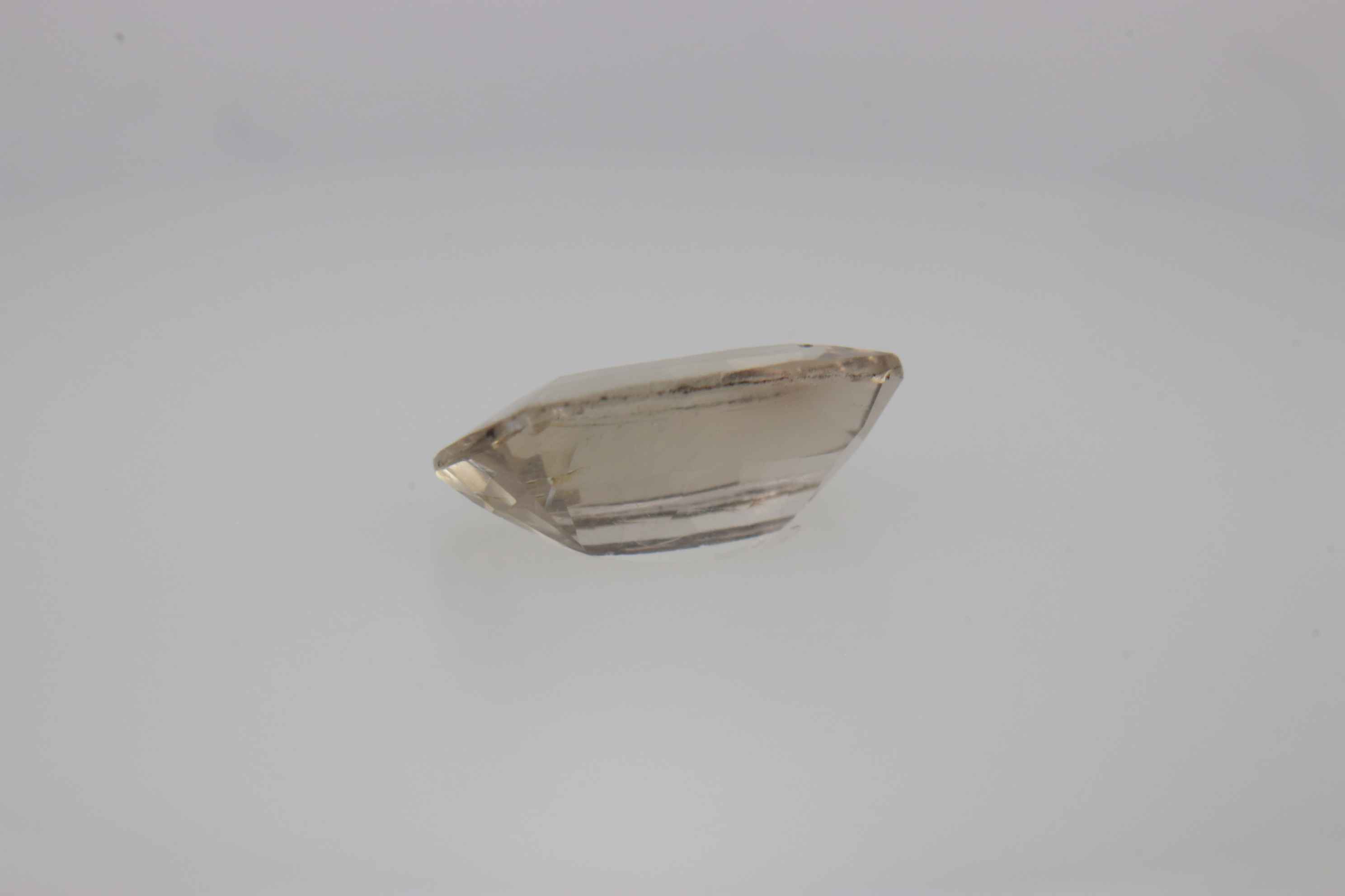 0.7ct White - Off Spinel SI1 Fancy Cushion Shape (7.3x4.4x2.8 mm) Unheated gemstone from Sri Lanka