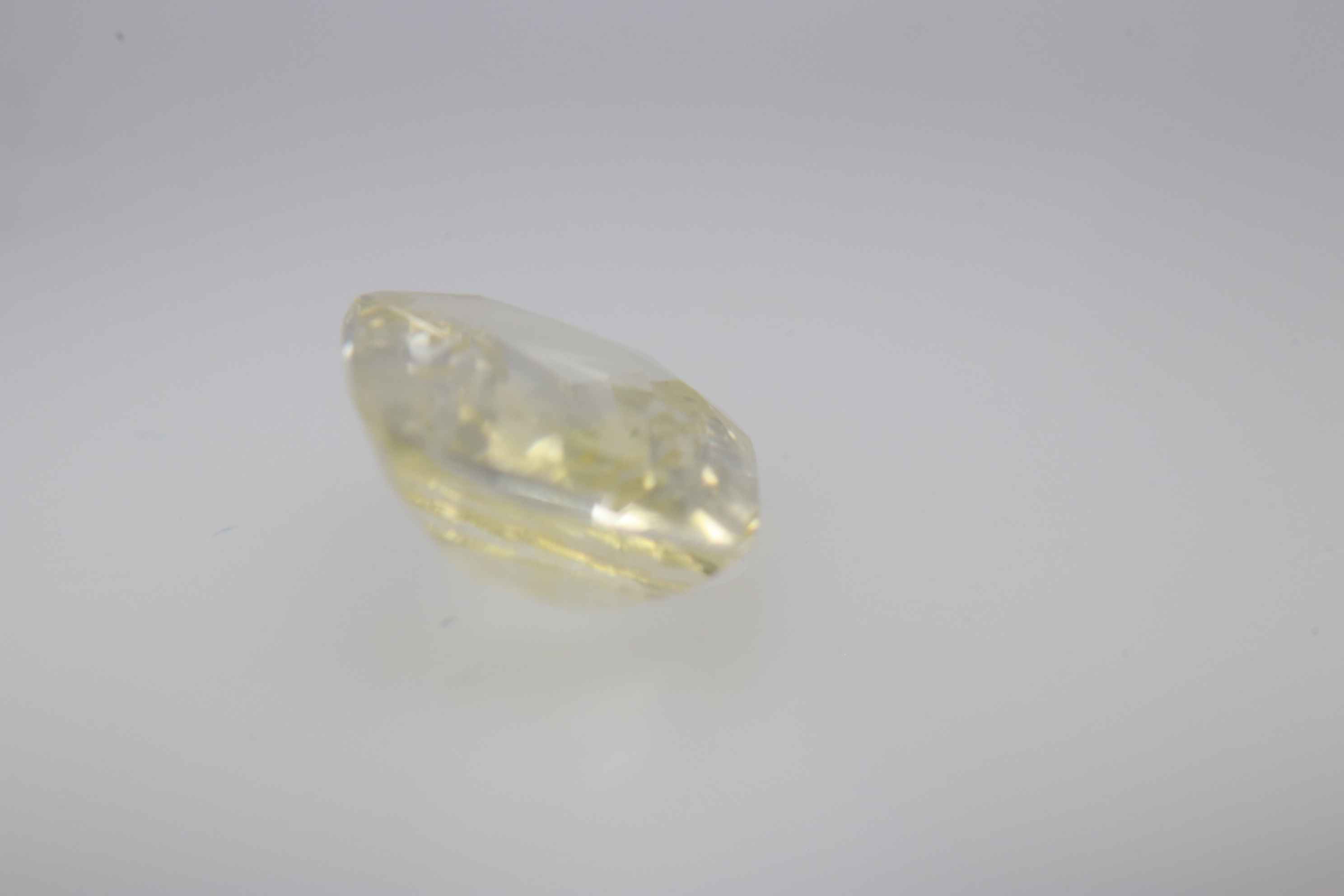 2ct Yellow Sapphire VVS1 Fancy Cushion Shape (8.7x6.4x3.2 mm) Unheated gemstone from Sri Lanka