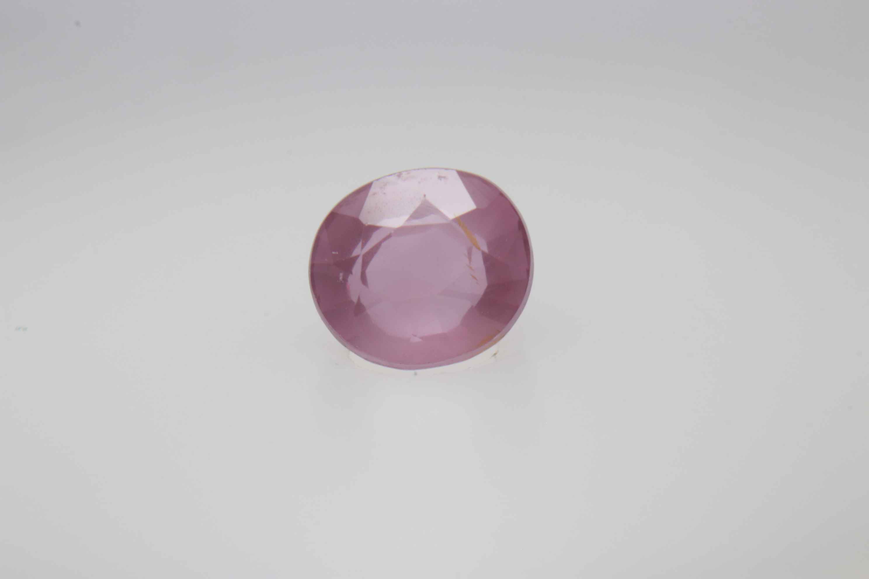 0.6ct Hot Pink Padparadscha VVS Oval Shape (5.2x4.6x3.1 mm) Unheated gemstone from Sri Lanka