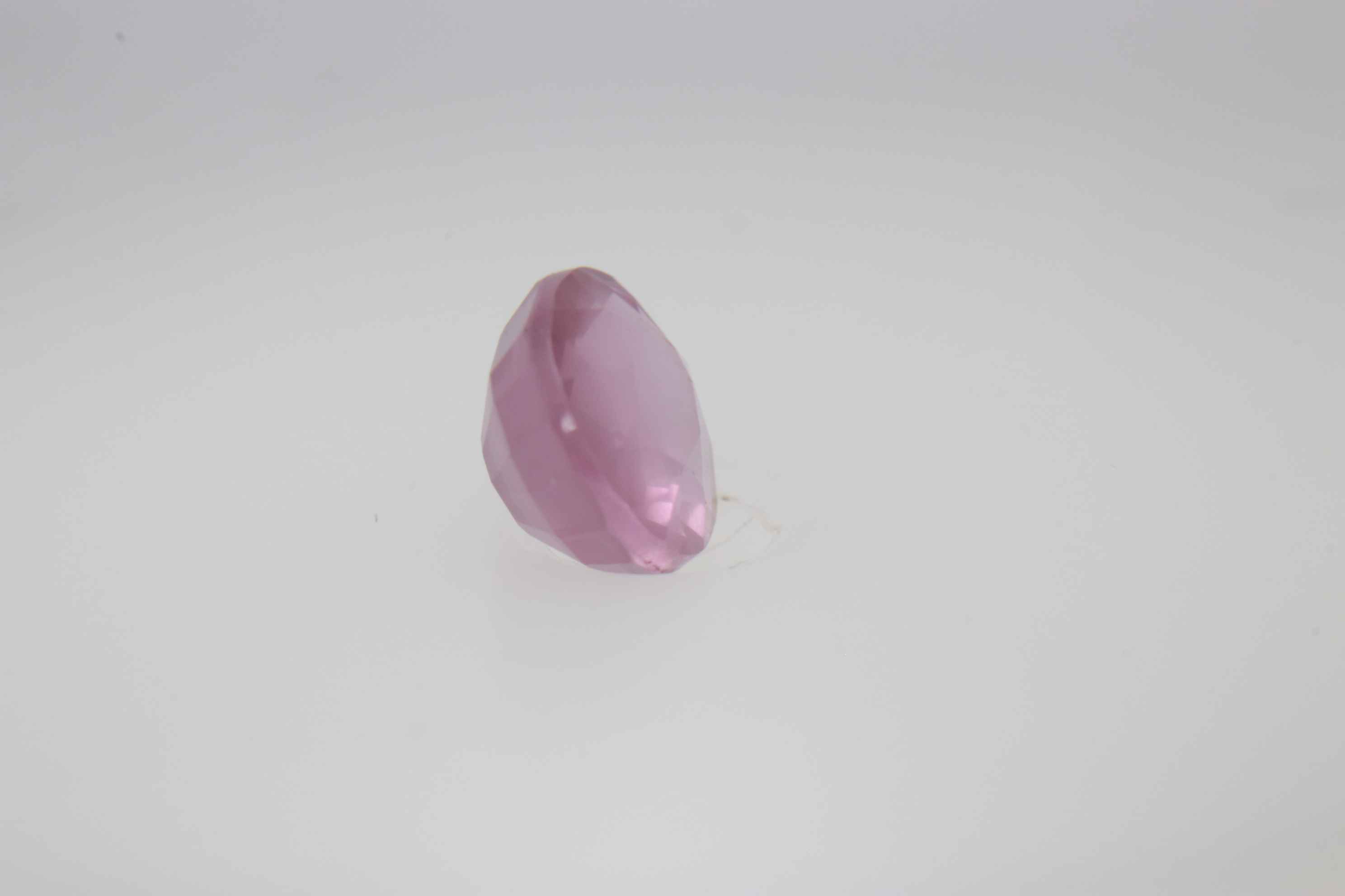 0.6ct Hot Pink Padparadscha VVS Oval Shape (5.2x4.6x3.1 mm) Unheated gemstone from Sri Lanka