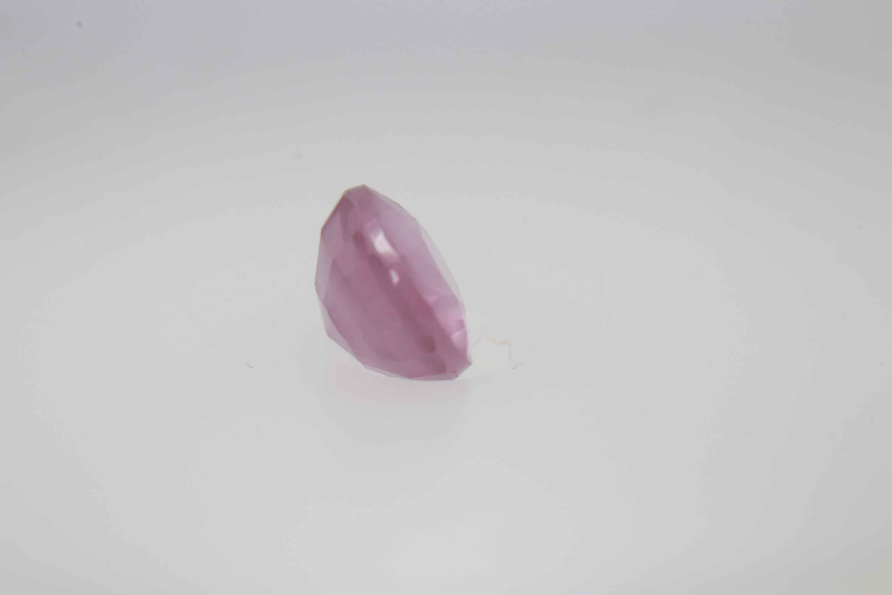 0.6ct Hot Pink Padparadscha VVS Oval Shape (5.2x4.6x3.1 mm) Unheated gemstone from Sri Lanka