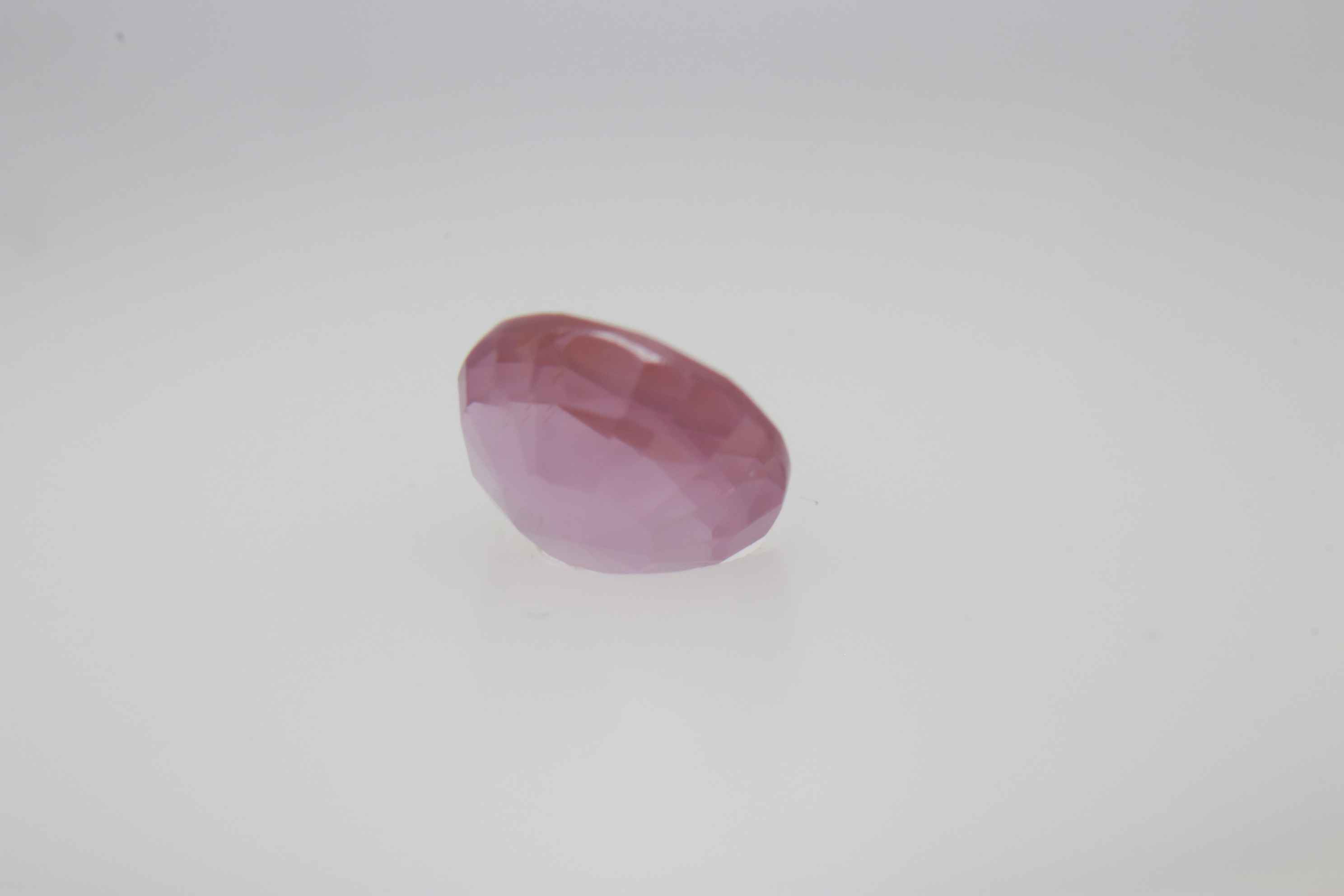 0.6ct Hot Pink Padparadscha VVS Oval Shape (5.2x4.6x3.1 mm) Unheated gemstone from Sri Lanka