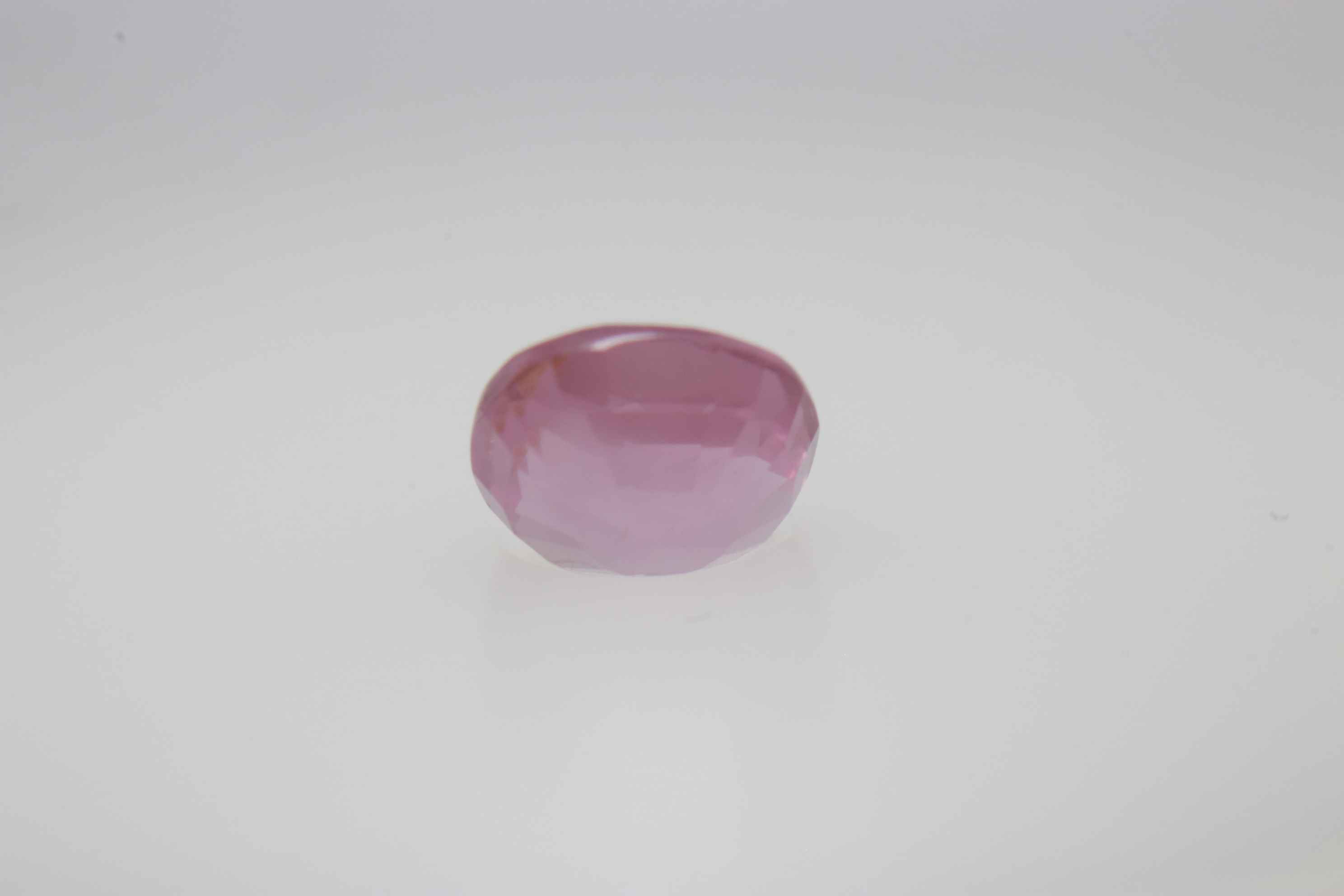 0.6ct Hot Pink Padparadscha VVS Oval Shape (5.2x4.6x3.1 mm) Unheated gemstone from Sri Lanka