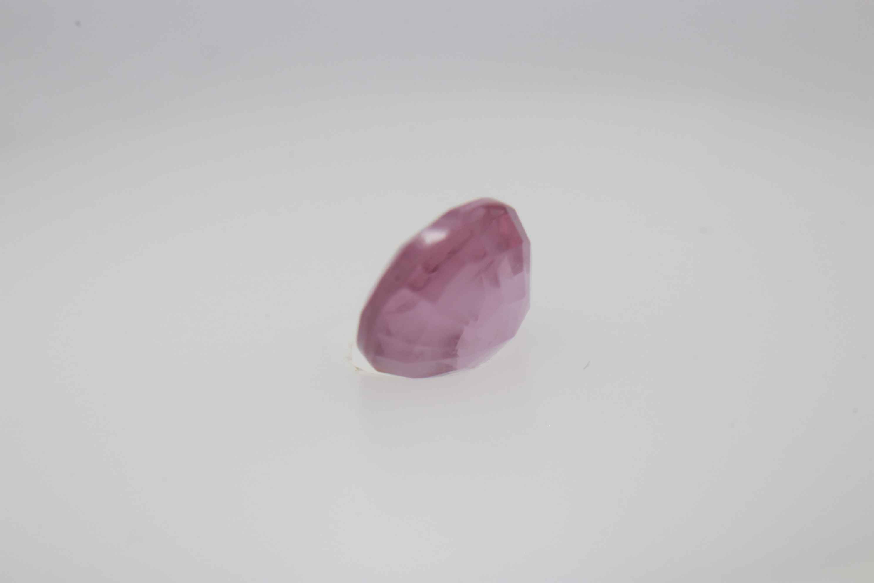 0.6ct Hot Pink Padparadscha VVS Oval Shape (5.2x4.6x3.1 mm) Unheated gemstone from Sri Lanka