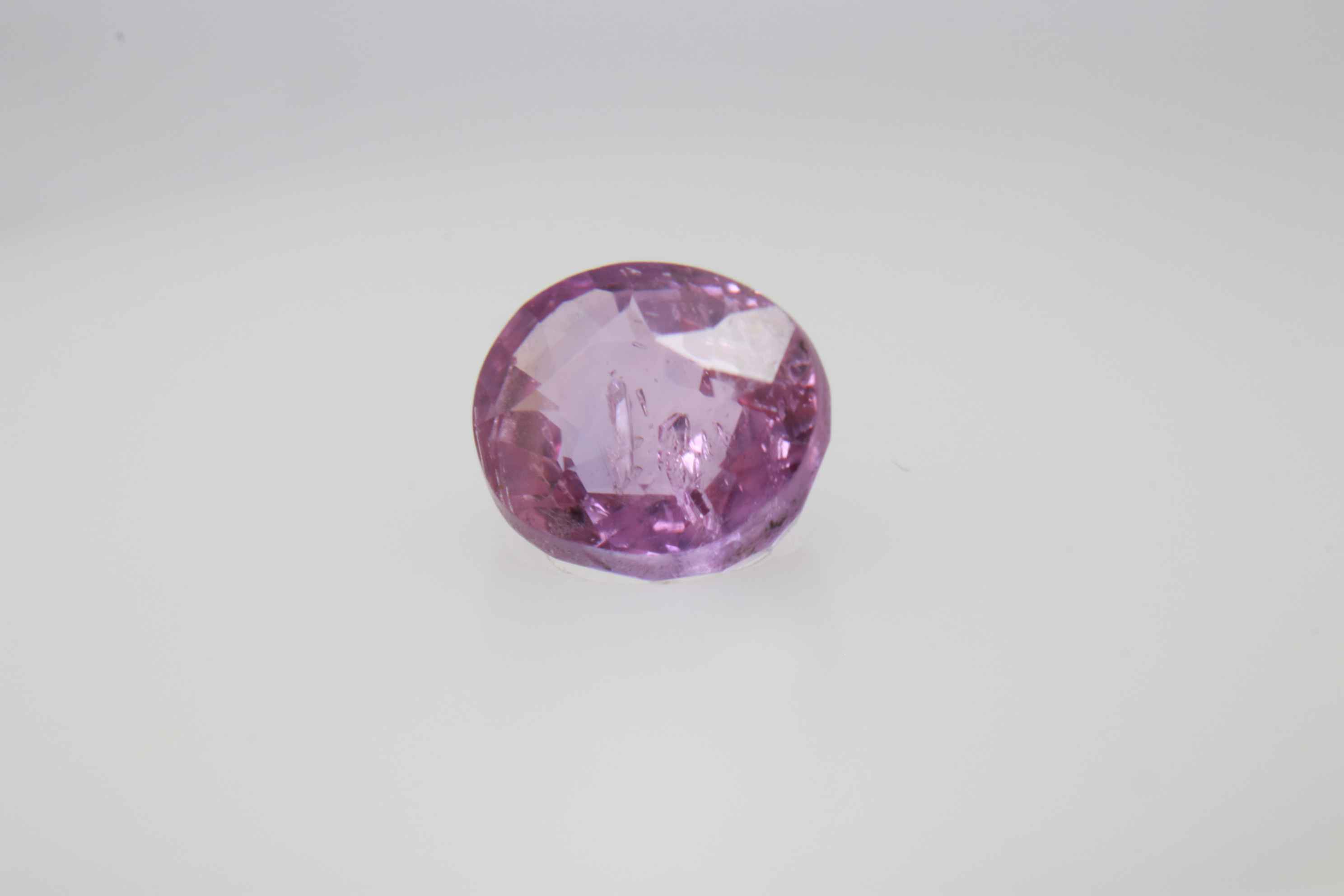 0.9ct Hot Pink Padparadscha VVS Oval Shape (5.8x4.8x3.5 mm) Unheated gemstone from Sri Lanka