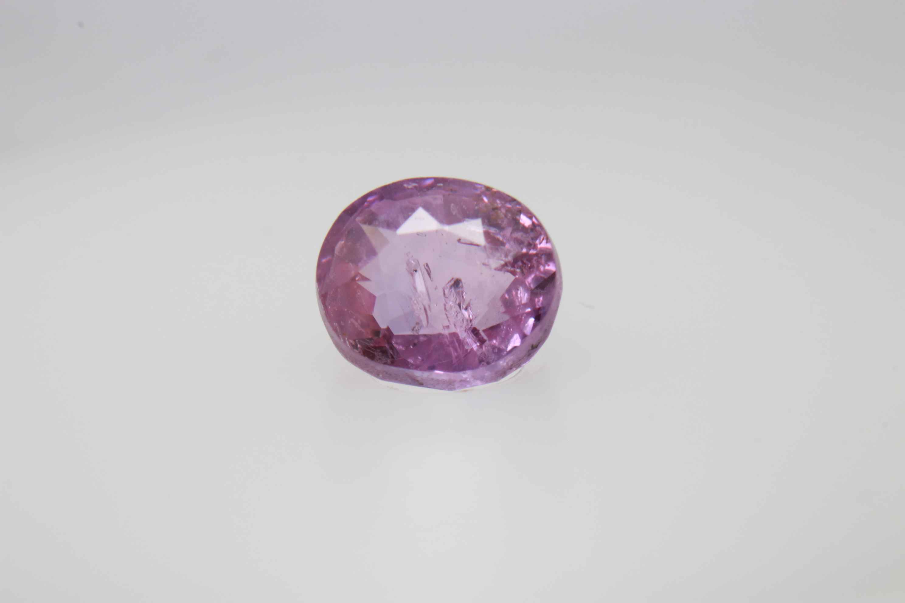 0.9ct Hot Pink Padparadscha VVS Oval Shape (5.8x4.8x3.5 mm) Unheated gemstone from Sri Lanka