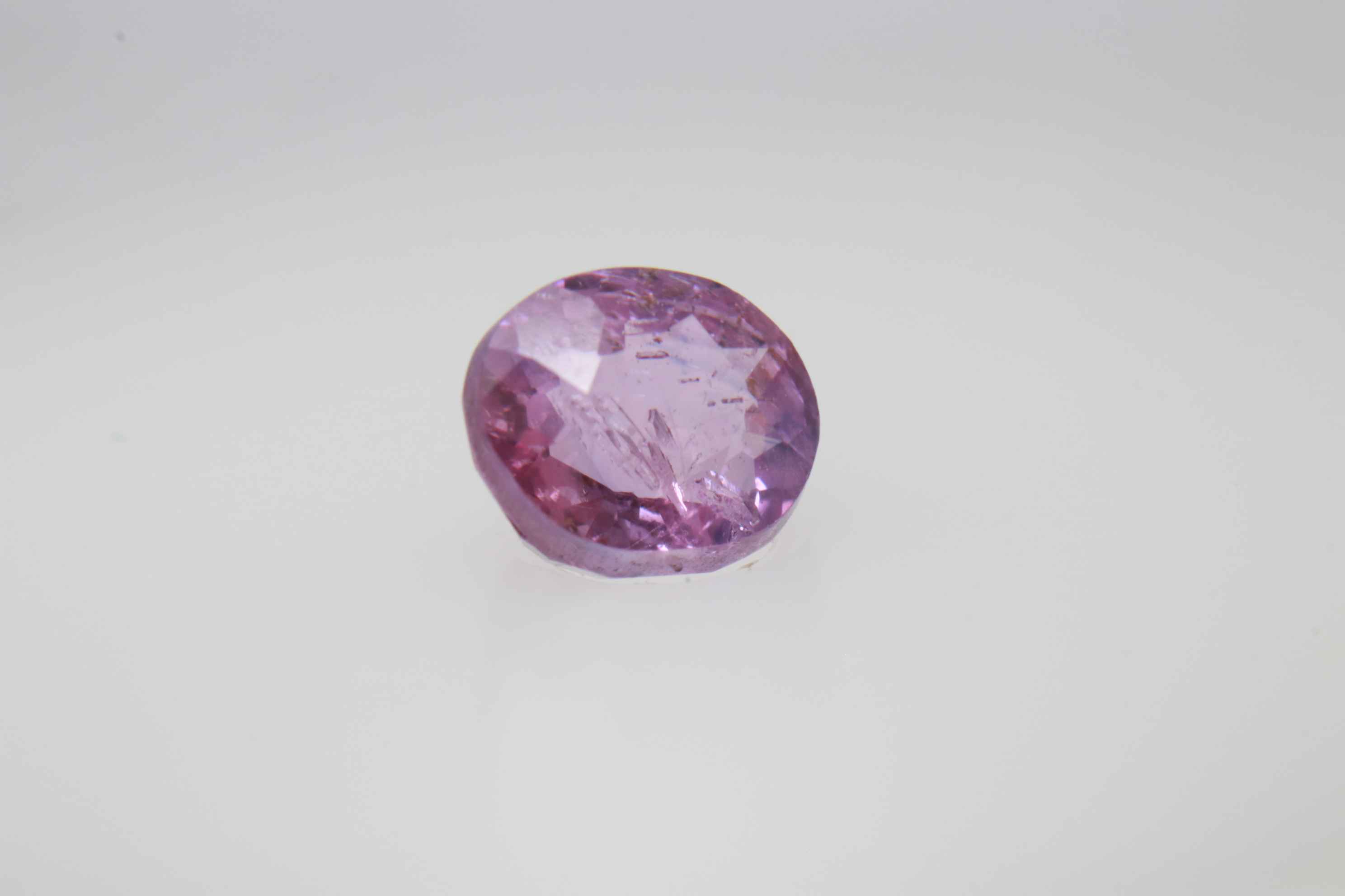 0.9ct Hot Pink Padparadscha VVS Oval Shape (5.8x4.8x3.5 mm) Unheated gemstone from Sri Lanka