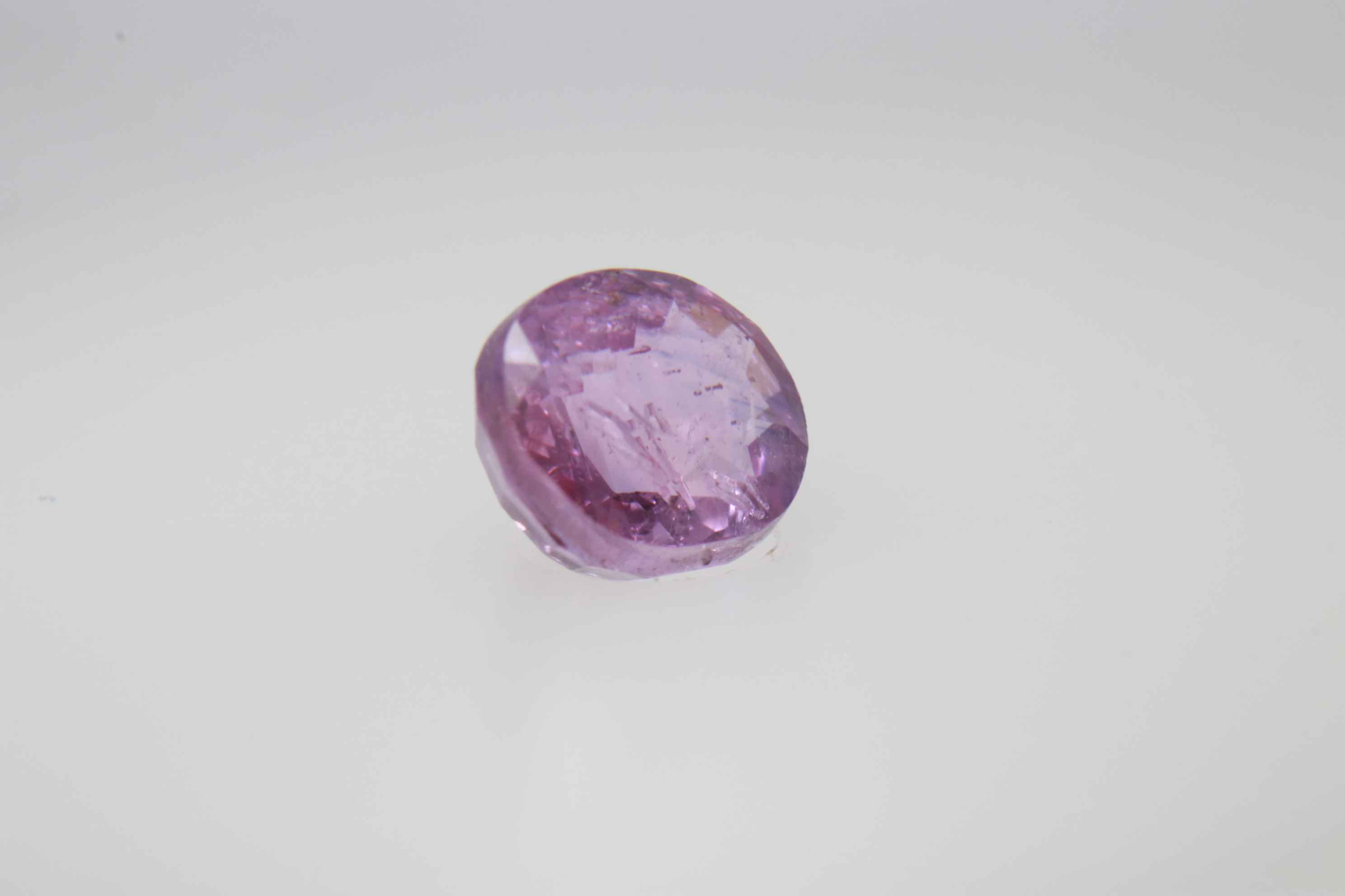 0.9ct Hot Pink Padparadscha VVS Oval Shape (5.8x4.8x3.5 mm) Unheated gemstone from Sri Lanka