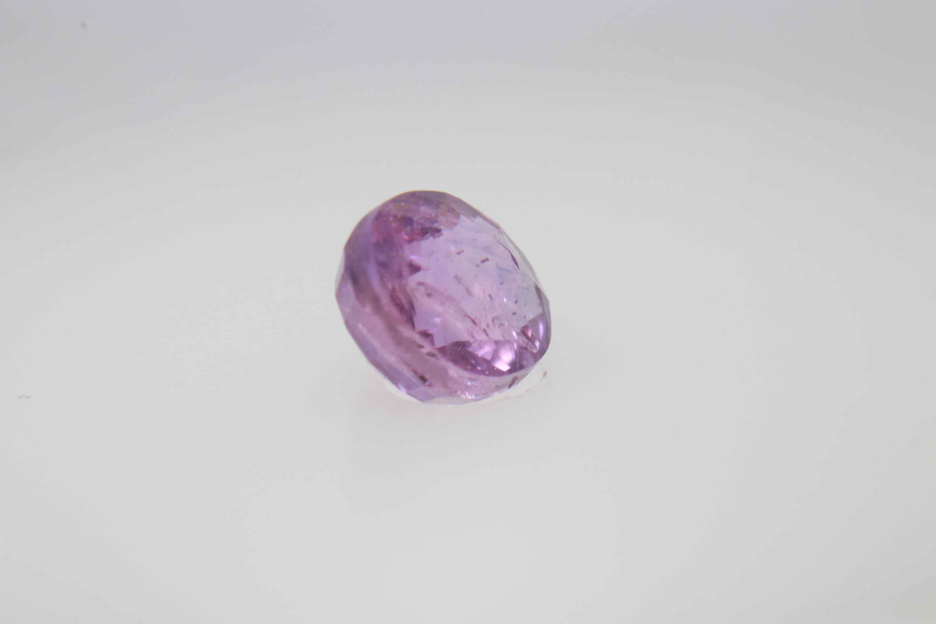 0.9ct Hot Pink Padparadscha VVS Oval Shape (5.8x4.8x3.5 mm) Unheated gemstone from Sri Lanka