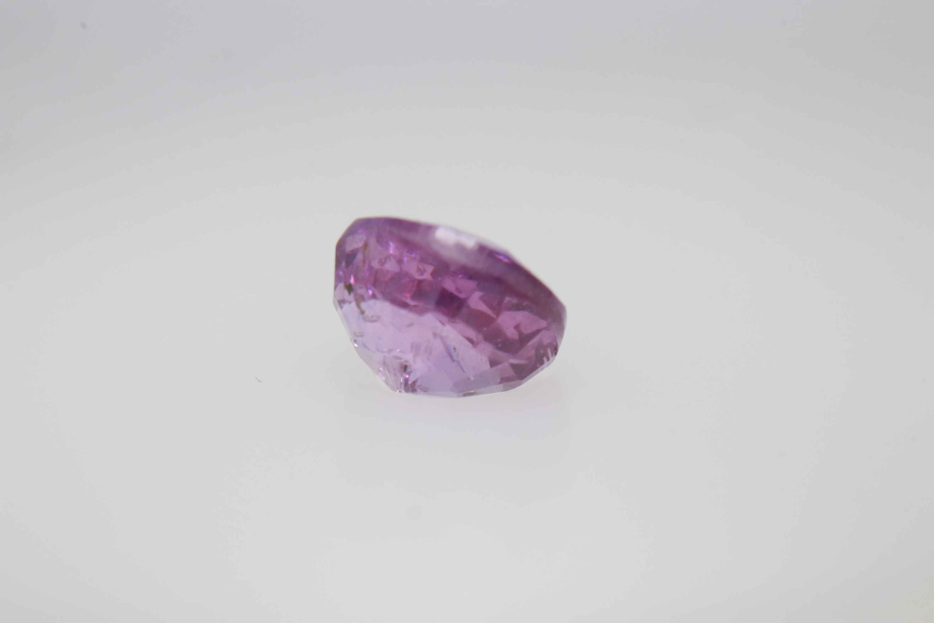 0.9ct Hot Pink Padparadscha VVS Oval Shape (5.8x4.8x3.5 mm) Unheated gemstone from Sri Lanka