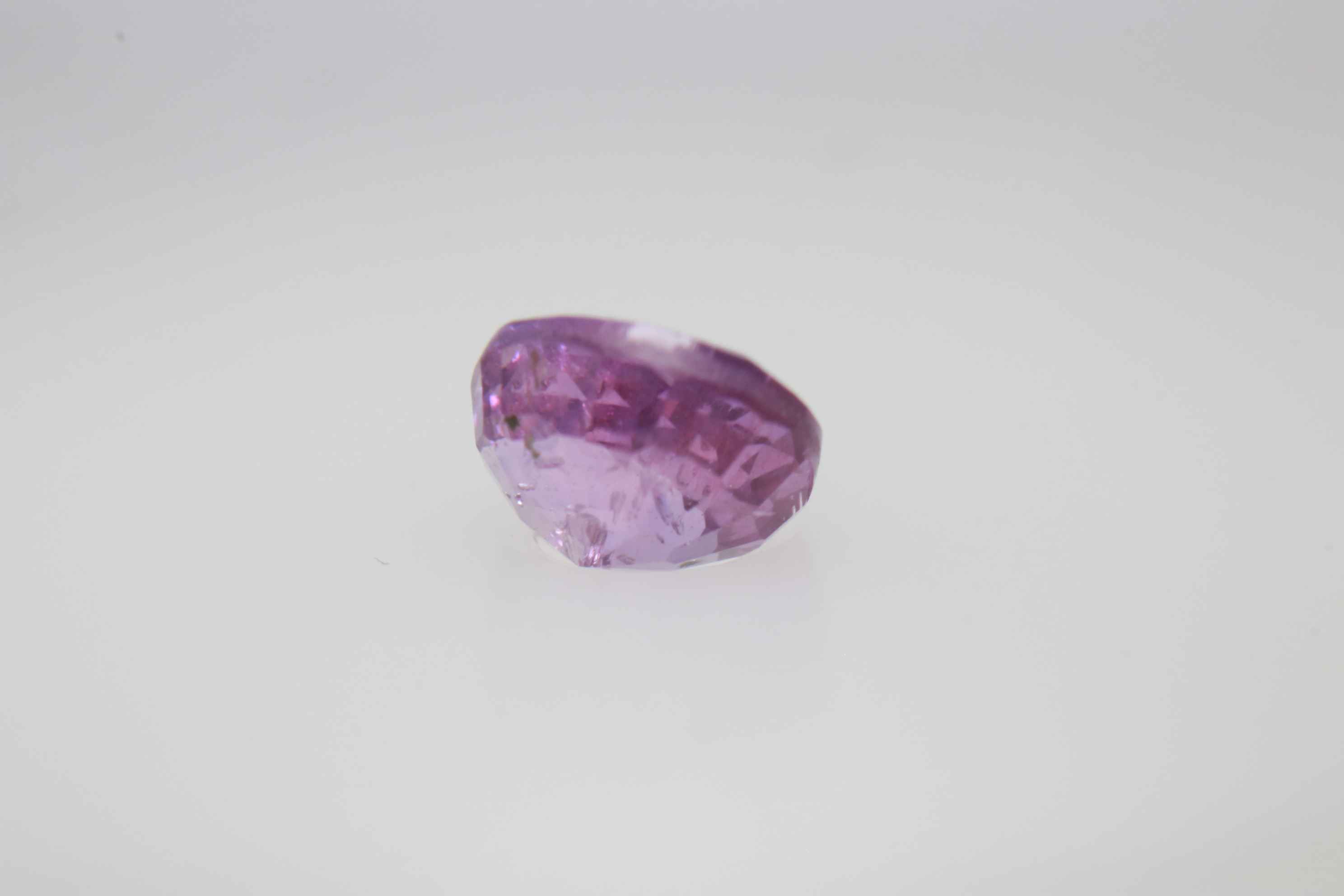 0.9ct Hot Pink Padparadscha VVS Oval Shape (5.8x4.8x3.5 mm) Unheated gemstone from Sri Lanka