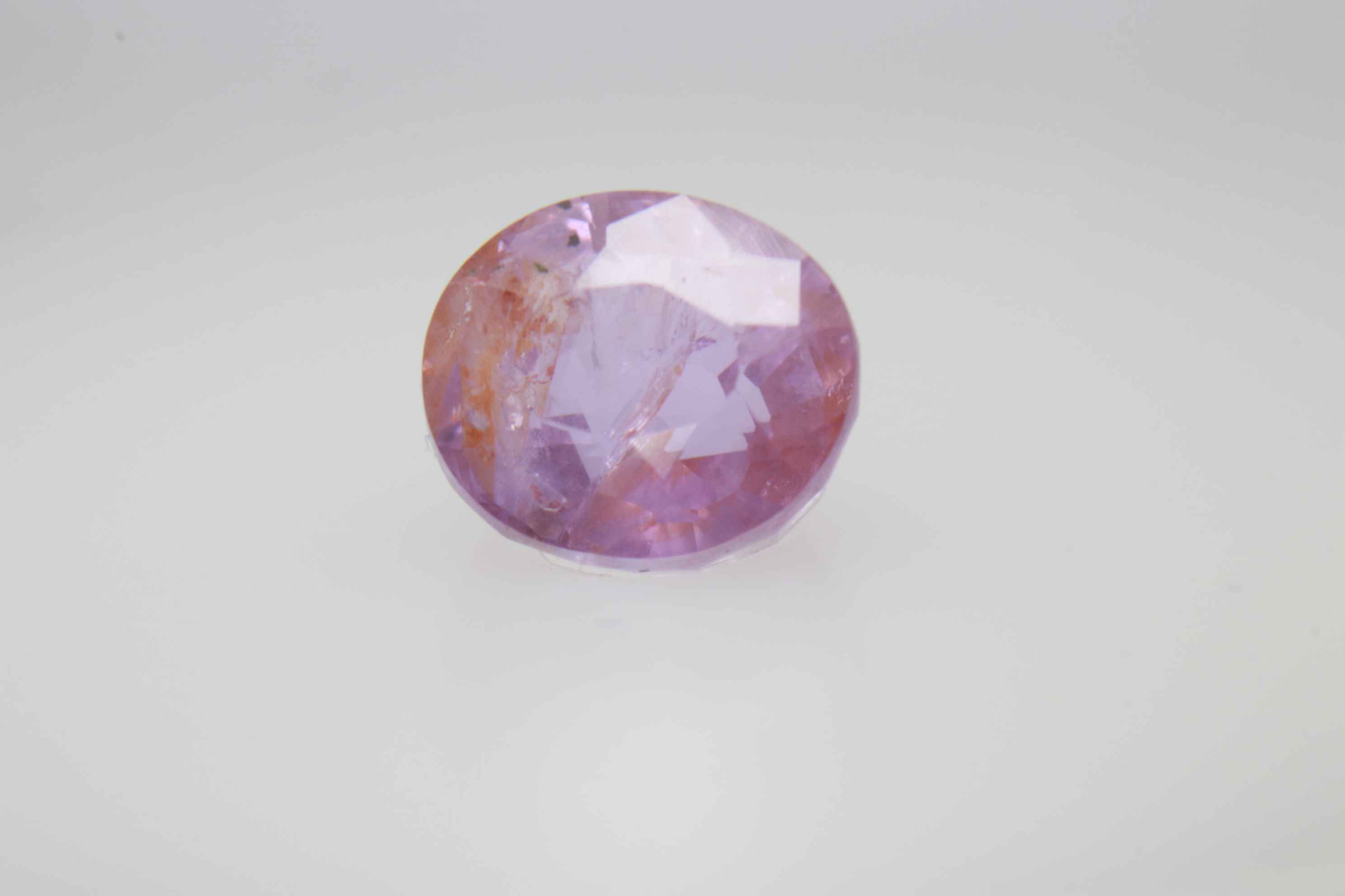 1.6ct Light Pink Padparadscha Feather Oval Shape (6.6x5.9x4.2 mm) Unheated gemstone from Sri Lanka