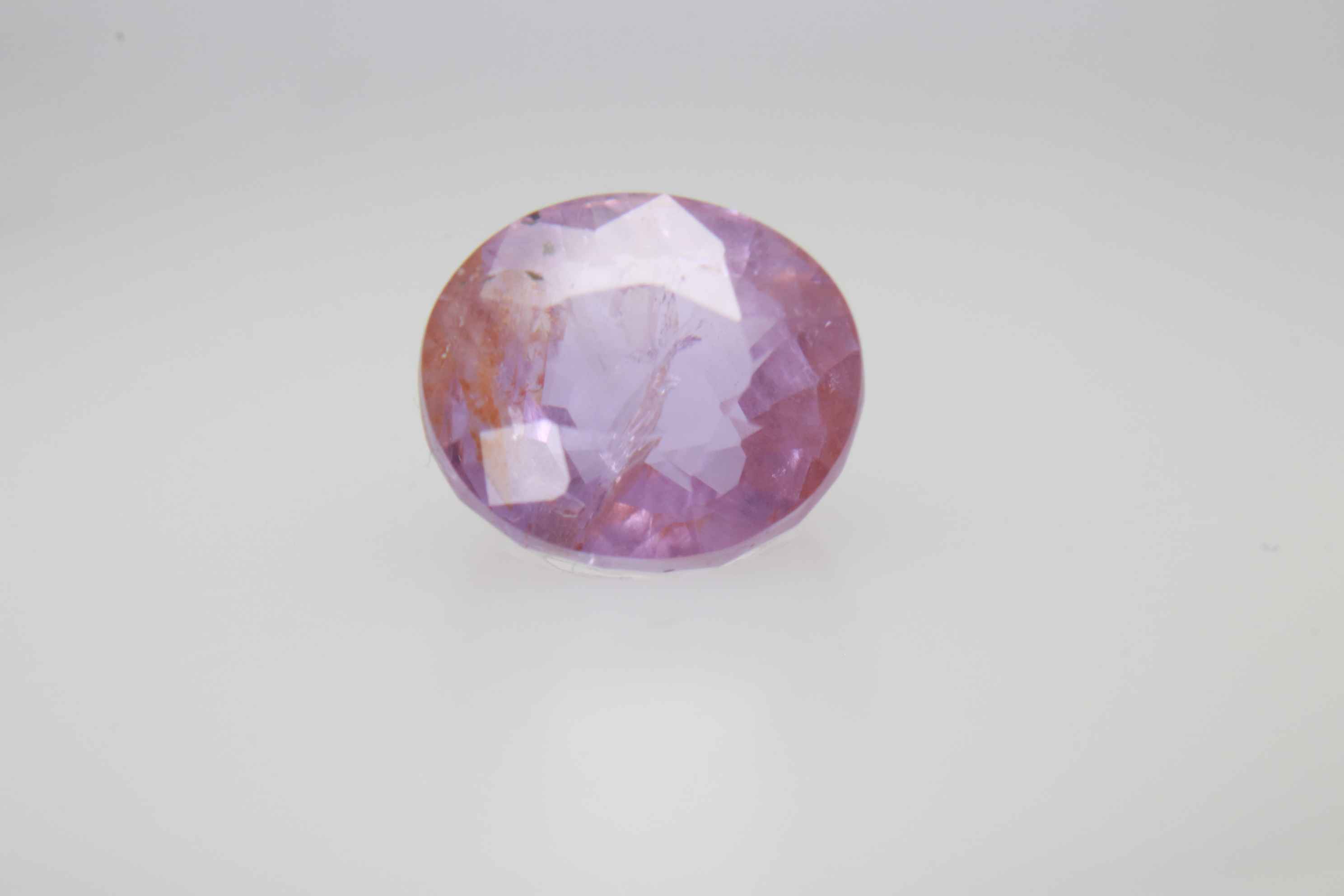 1.6ct Light Pink Padparadscha Feather Oval Shape (6.6x5.9x4.2 mm) Unheated gemstone from Sri Lanka