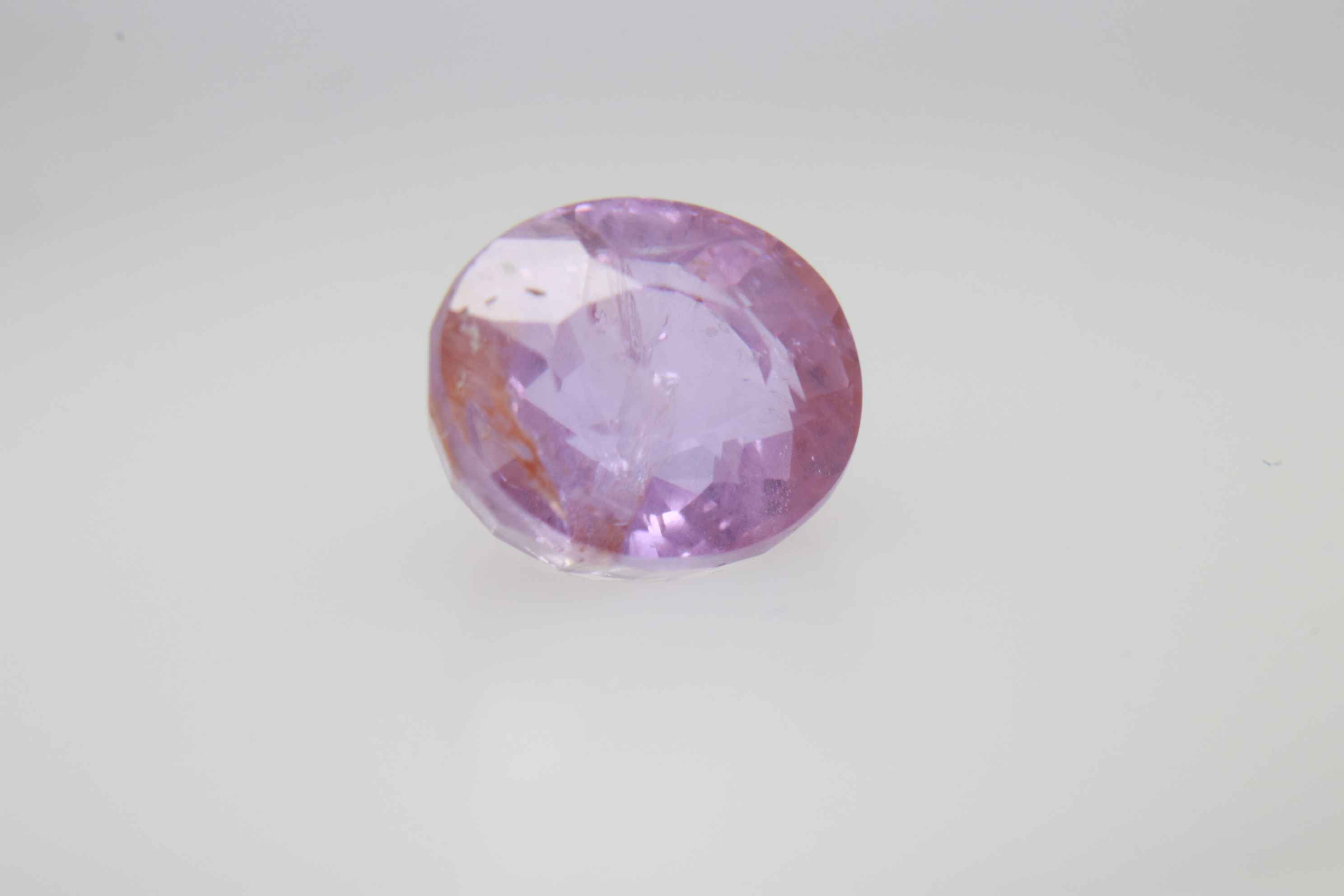 1.6ct Light Pink Padparadscha Feather Oval Shape (6.6x5.9x4.2 mm) Unheated gemstone from Sri Lanka