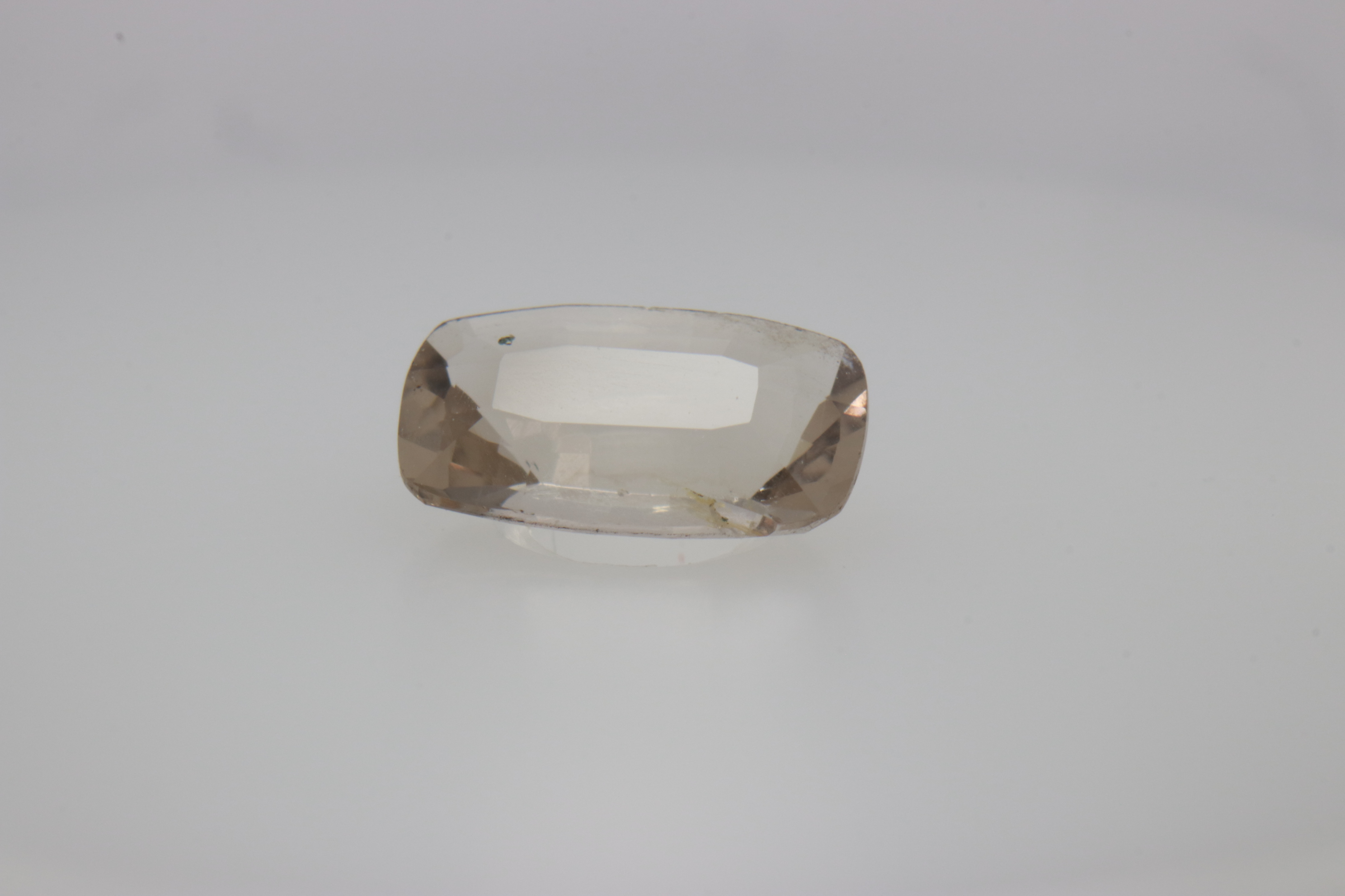 0.7ct White - Off Spinel SI1 Fancy Cushion Shape (7.3x4.4x2.8 mm) Unheated gemstone from Sri Lanka