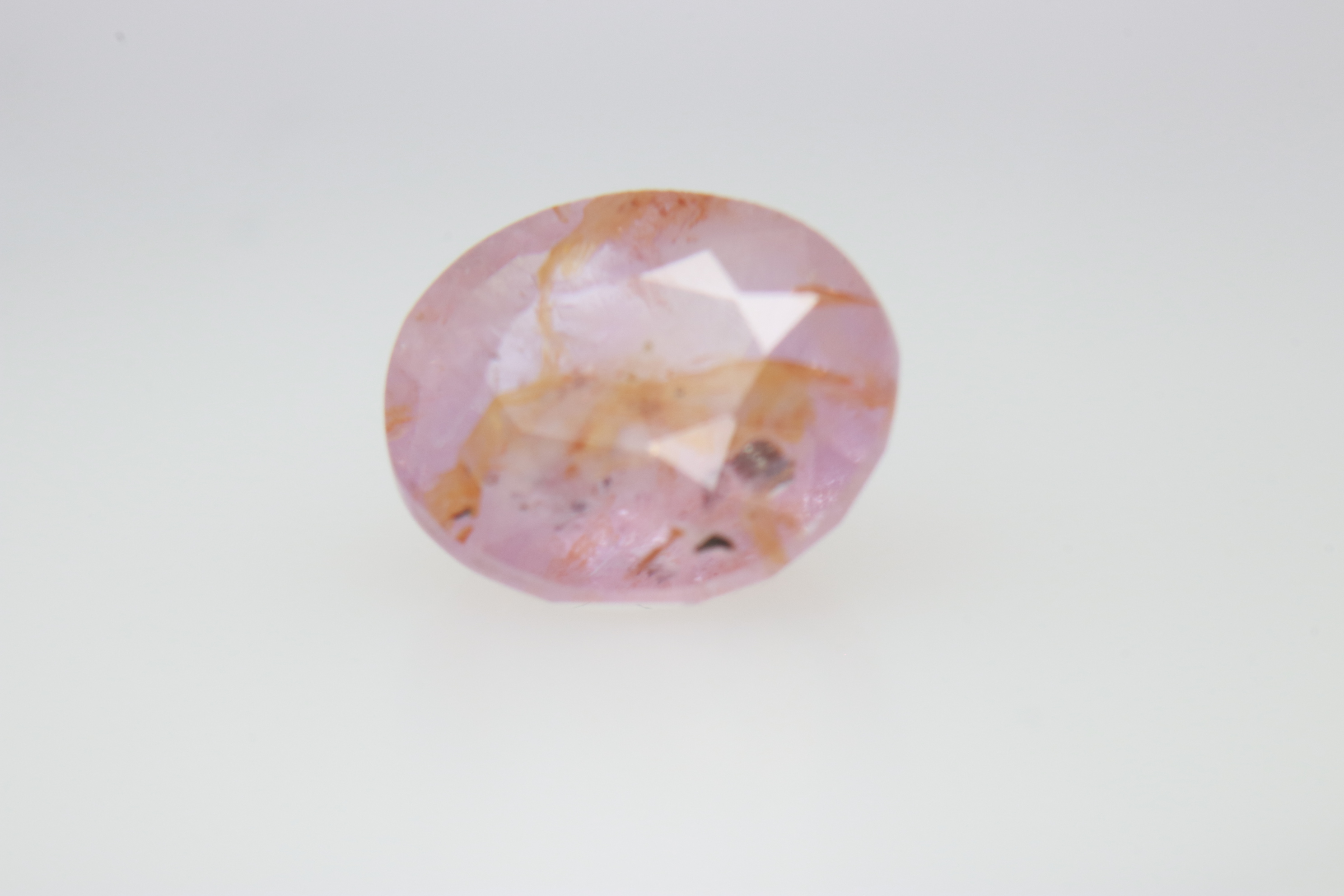 2.2ct Hot Pink Padparadscha Twinning wisp Oval Shape (7.8x6.8x4.5 mm) Unheated gemstone from Sri Lanka