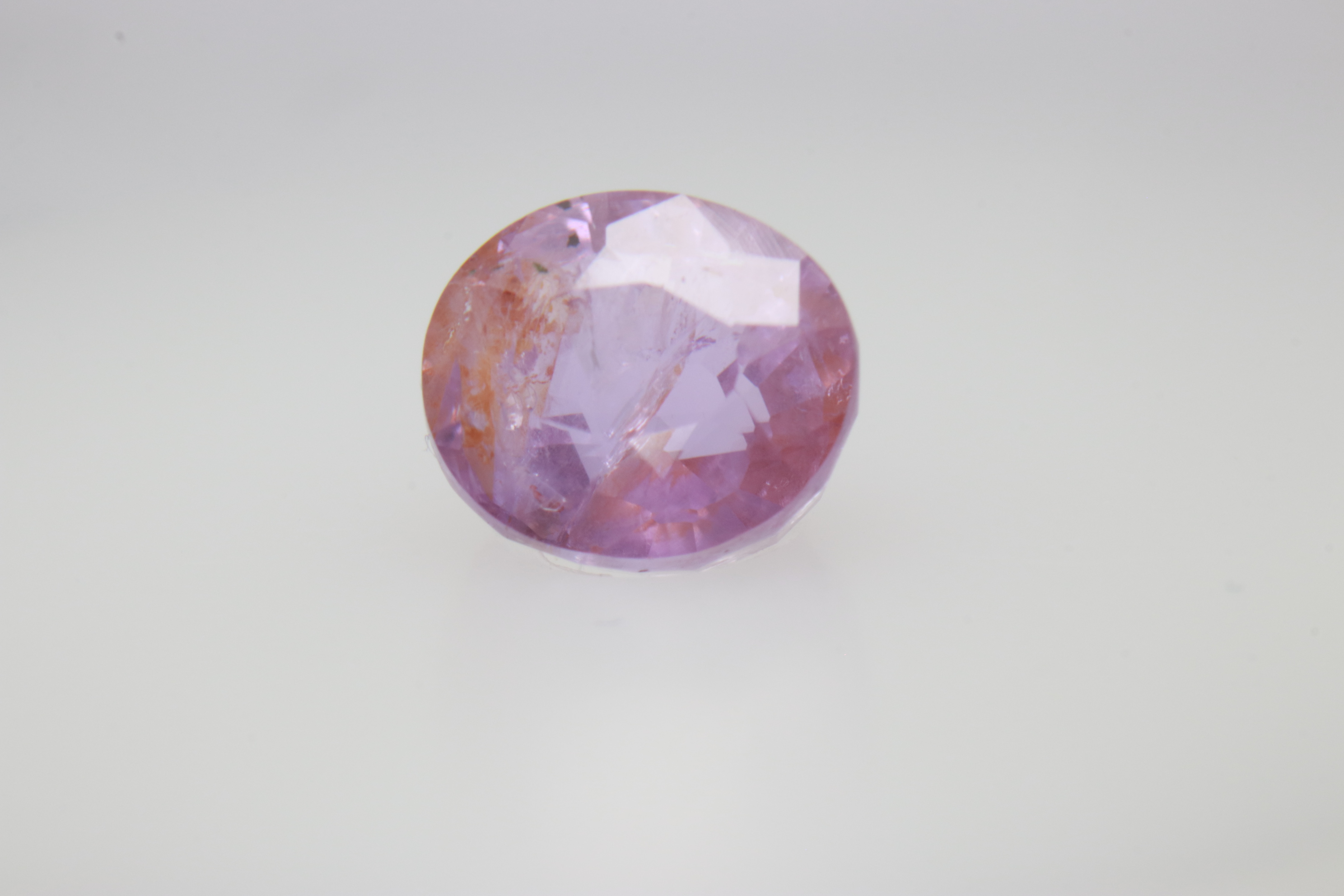 1.6ct Light Pink Padparadscha Feather Oval Shape (6.6x5.9x4.2 mm) Unheated gemstone from Sri Lanka