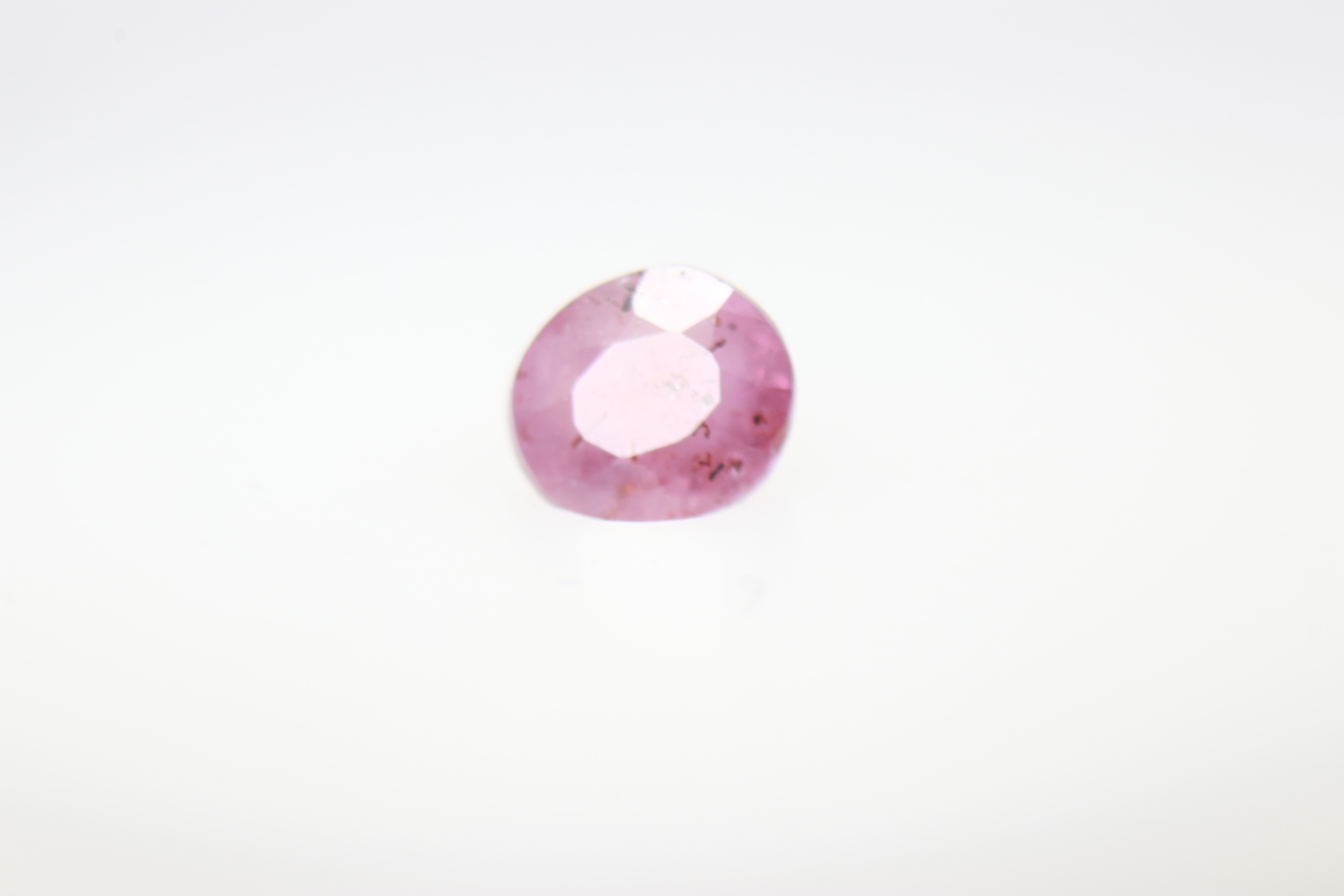 0.5ct Light Pink Padparadscha SI1 Oval Shape (4.9x3.8x2.8 mm) Unheated gemstone from Sri Lanka